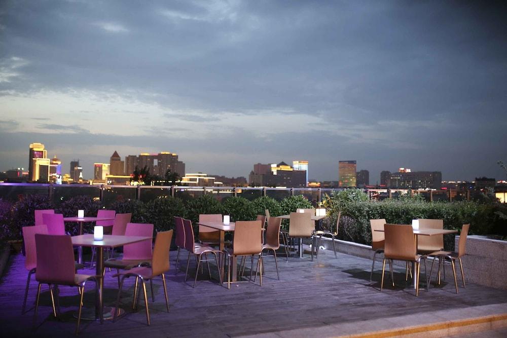 Hyatt Regency Чанчунь Экстерьер фото